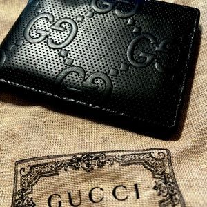 Gucci GG Embossed Bi-Fold Wallet